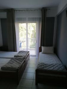 Krevet ili kreveti u jedinici u okviru objekta Villa Olimp
