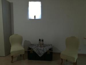 Posedenie v ubytovaní Casa Vacanza Da Sofì