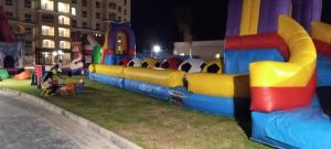 ein bunter Spielplatz in einer Stadt bei Nacht in der Unterkunft Aqua view Park North coast ---91km in El-Alamein