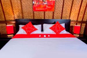 Ένα ή περισσότερα κρεβάτια σε δωμάτιο στο D'Wahana Resort