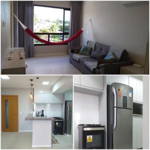 a kitchen and a living room with a couch and a refrigerator at Flat Paraiso dos Coqueiros in Guarajuba