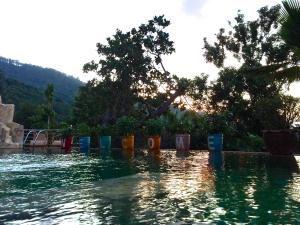 einen Pool mit bunten Mülltonnen im Wasser in der Unterkunft Ever dreamed of staying in a 2 Bedroom Castle-SDV044C-By Samui Dream Villas in Koh Samui 