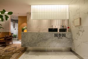 a lobby with a reception desk in a building at BLO BY BLO HOTEL in Daegu