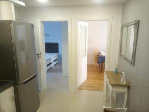 Kuchyň nebo kuchyňský kout v ubytování Apartament Gruba Ryba