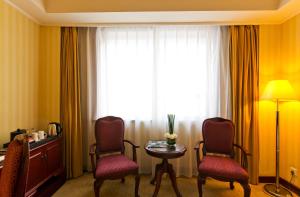 Příslušenství pro přípravu čaje a kávy v ubytování Clarion Hotel Tianjin
