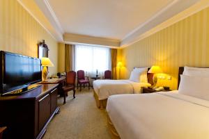 TV a/nebo společenská místnost v ubytování Clarion Hotel Tianjin