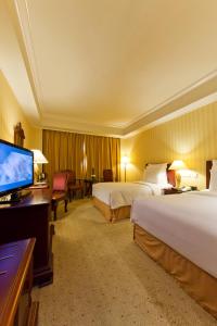 TV a/nebo společenská místnost v ubytování Clarion Hotel Tianjin
