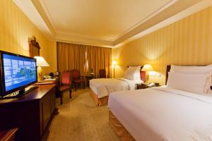 TV a/nebo společenská místnost v ubytování Clarion Hotel Tianjin