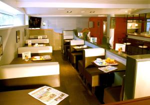 Posezení v ubytování Hotel les Pecheurs