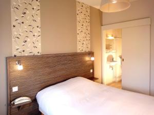 Postel nebo postele na pokoji v ubytování Hotel les Pecheurs