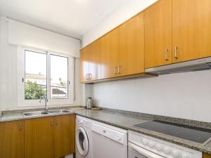 Kuchyň nebo kuchyňský kout v ubytování Sitges Spaces Terrace Apartment- 1 Bedroom, 1Bathroom, Huge Terrace