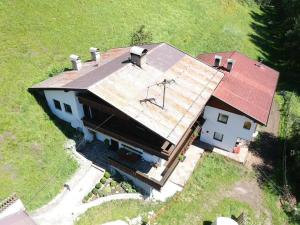 an overhead view of a house with a roof at Landhaus Kohlstatt in Finkenberg
