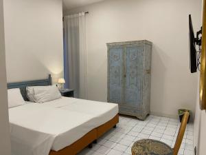 Postel nebo postele na pokoji v ubytování Jazz Hotel