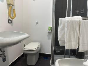 Koupelna v ubytování Jazz Hotel