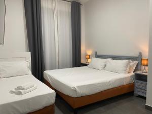Katil atau katil-katil dalam bilik di Jazz Hotel
