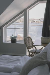 Postel nebo postele na pokoji v ubytování Skärgårdshotellet Hönö + 37 fotografií