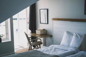 Postel nebo postele na pokoji v ubytování Skärgårdshotellet Hönö
