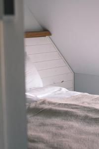 Postel nebo postele na pokoji v ubytování Skärgårdshotellet Hönö