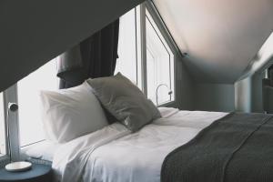 Postel nebo postele na pokoji v ubytování Skärgårdshotellet Hönö
