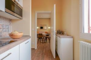 Køkken eller tekøkken på Attico di Via d'Azeglio