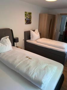 Postel nebo postele na pokoji v ubytování Ferienwohnung Siegen Eiserfeld 3