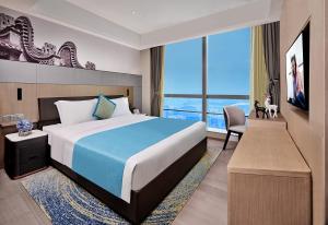 Postel nebo postele na pokoji v ubytování Somerset Bio-Island Guangzhou + 37 fotografií