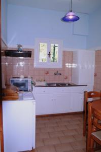Kuchyň nebo kuchyňský kout v ubytování Nikolas apartment Alexia,Kalami Bay