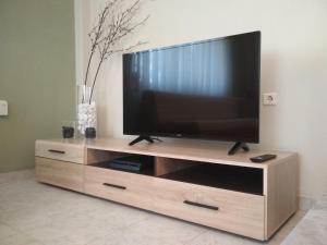 Een TV en/of entertainmentcenter bij Victoria Maisonette
