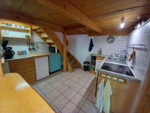 Kuchyň nebo kuchyňský kout v ubytování Chalet Elza