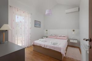 Posteľ alebo postele v izbe v ubytovaní Holiday house Luna in Makarska with private pool + 18 fotografií