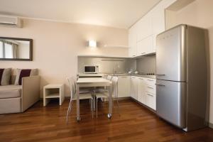 A kitchen or kitchenette at Ramada Plaza by Wyndham Milano