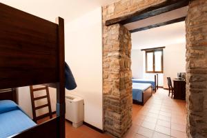 Katil atau katil-katil dalam bilik di L'Antico Casale