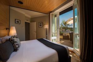 Postel nebo postele na pokoji v ubytování 47 Boutique Hotel