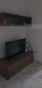 TV a/nebo společenská místnost v ubytování Apartman Zvončica