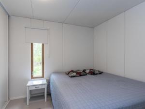 Postel nebo postele na pokoji v ubytování Holiday Home Rantapelto by Interhome