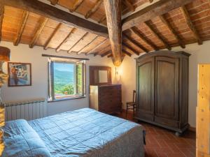 Postel nebo postele na pokoji v ubytování Holiday Home Il Castagneto-1 by Interhome