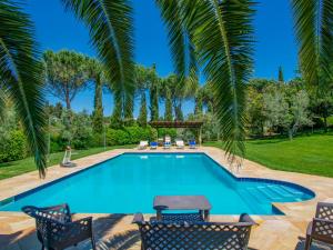The swimming pool at or close to Holiday Home Villa Rosa by Interhome