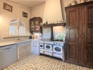 A kitchen or kitchenette at Holiday Home Villa Rosa by Interhome Még 37 kép