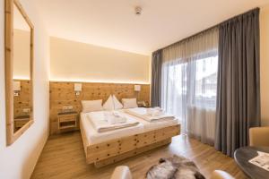 Posteľ alebo postele v izbe v ubytovaní Hotel Kornock