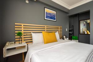 A bed or beds in a room at Sayeban Hotel Istanbul