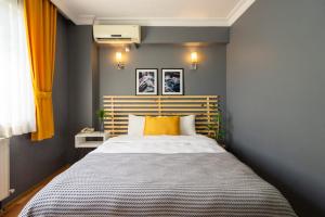 A bed or beds in a room at Sayeban Hotel Istanbul