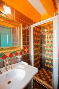 a bathroom with a sink and a shower at Casale Villa Giulia Marina di Lesina in Lesina