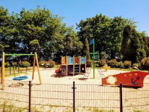 a playground with many different types of playground equipment at ZATOKA ZEN PUCK in Puck