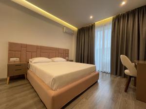 Postel nebo postele na pokoji v ubytování Hotel Mare 2