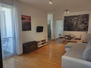 a living room with a couch and a table at CasaBelvedere Vista Mare e Comfort in Pescara