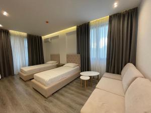 Llit o llits en una habitació de Hotel Mare 2