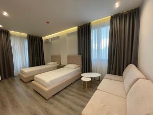 Postel nebo postele na pokoji v ubytování Hotel Mare 2 + 37 fotografií