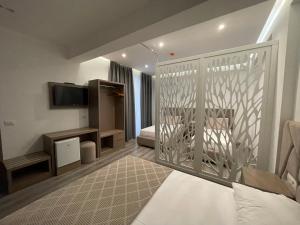 Postel nebo postele na pokoji v ubytování Hotel Mare 2