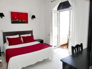 Postel nebo postele na pokoji v ubytování Hotel Cubata