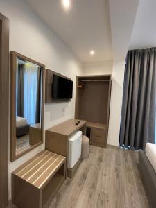 TV a/nebo společenská místnost v ubytování Hotel Mare 2